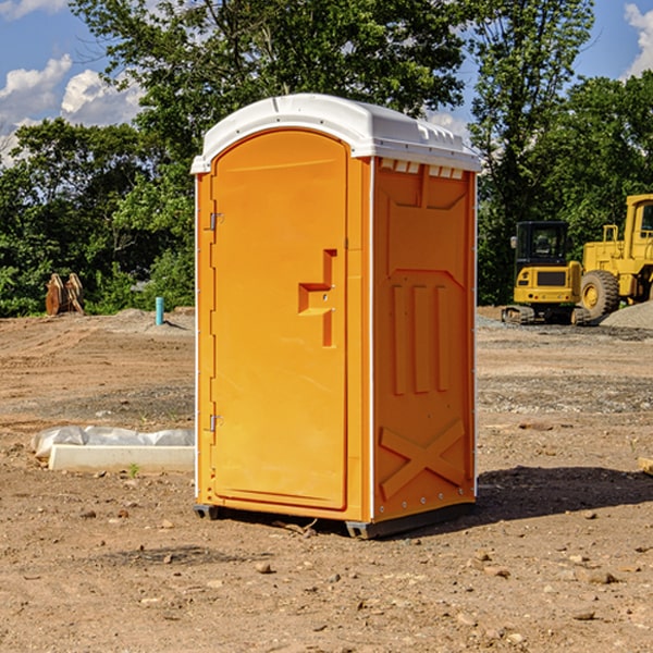 how often are the porta potties cleaned and serviced during a rental period in Newbury